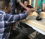 Youth Groups Help CARITAS Build Tables and Beds for Families